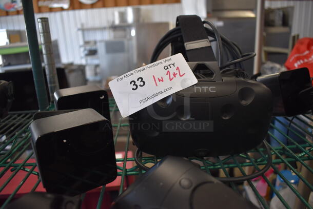 HTC VR Headset w/ 2 HTC Controllers,  2 HTC 2PR8100 Vive Base Stations and 2 Base Station Chargers. 9x12x6, 4.5x5x9, 3.5x2.5x3.5 - Image 3 of 7