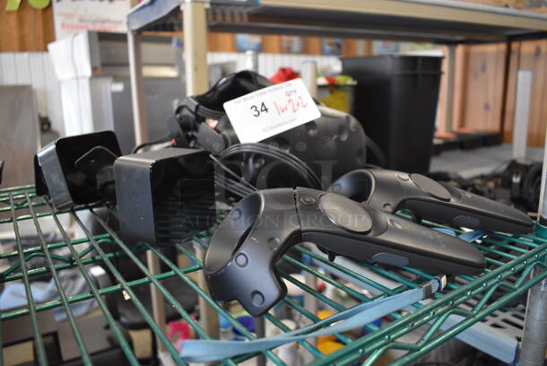 HTC VR Headset w/ 2 HTC Controllers,  2 HTC 2PR8100 Vive Base Stations and 2 Base Station Chargers. 9x12x6, 4.5x5x9, 3.5x2.5x3.5 - Image 2 of 5