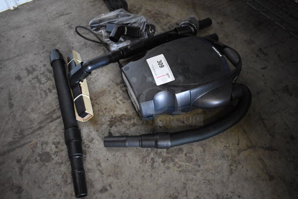 BRAND NEW! Oreck CC1600 Ultimate Handheld Bagged Canister Vacuum. Stock Picture Used For Gallery Picture. 120 Volts, 1 Phase. 14x10x16. Tested and Working! - Image 5 of 8