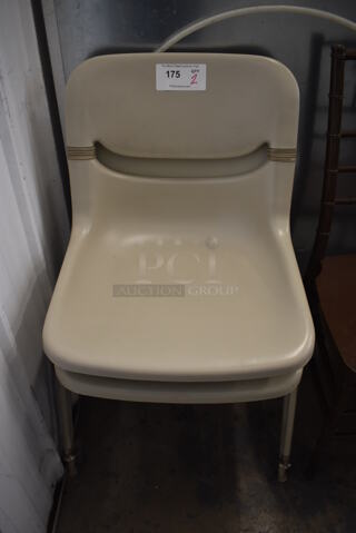 2 Tan Poly Chairs. 21x21x32. 2 Times Your Bid!