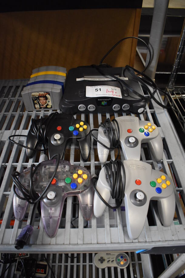 Nintendo 64 NUS-001 Countertop Video Game Console w/ 4 Controllers and 8 Various Games. 10.5x9x3 - Image 1 of 7