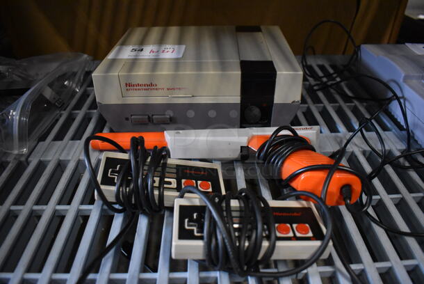 Nintendo Entertainment System NES NES-001 Gaming System w/ 2 Controllers and Gun Controller. 10.5x8x3.5 - Image 1 of 5