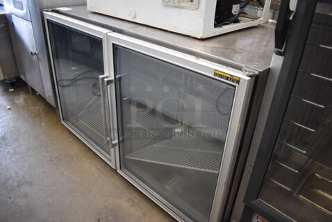 Silver King SKF48G Stainless Steel Commercial 2 Door Undercounter Freezer Merchandiser on Commercial Casters. 115 Volts, 1 Phase. 48x29x31. Tested and Powers On But Does Not Get Cold
