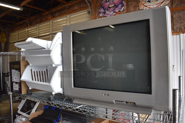 ALL ONE MONEY! Tier Lot of Various Items Including Sony Television and White Poly Baskets - Image 1 of 5