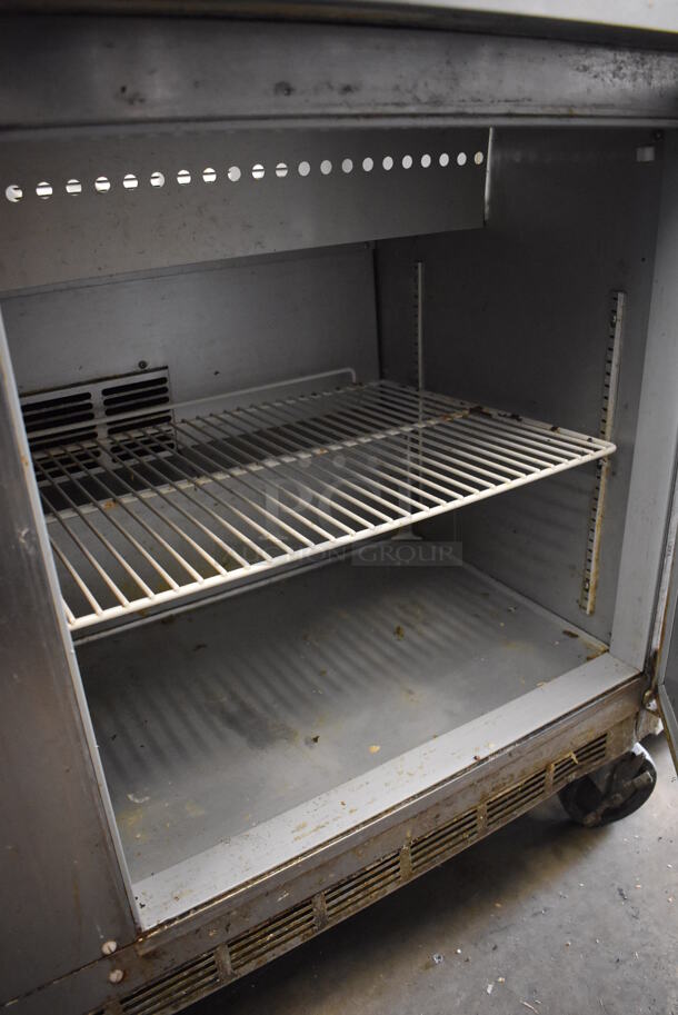 Beverage Air SPE60-16 Stainless Steel Commercial Prep Table w/ 2 Tier Over Shelf on Commercial Casters. 115 Volts, 1 Phase. 60x29x73. Tested and Powers On But Does Not Get Cold - Image 7 of 8