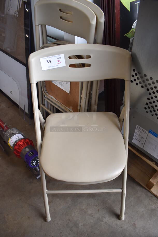 3 Tan Folding Chairs. 17x3x35. 3 Times Your Bid! - Image 1 of 3