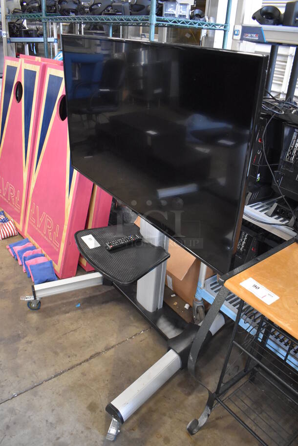 Samsung 50" 4K Smart LED Television on Cart. 120 Volts, 1 Phase. 44x32x55. Buyer Must Pick Up - We Will Not Ship This Item. Tested and Working! - Image 2 of 9