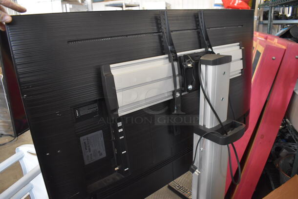 Samsung 50" 4K Smart LED Television on Cart. 120 Volts, 1 Phase. 44x32x55. Buyer Must Pick Up - We Will Not Ship This Item. Tested and Working! - Image 5 of 9