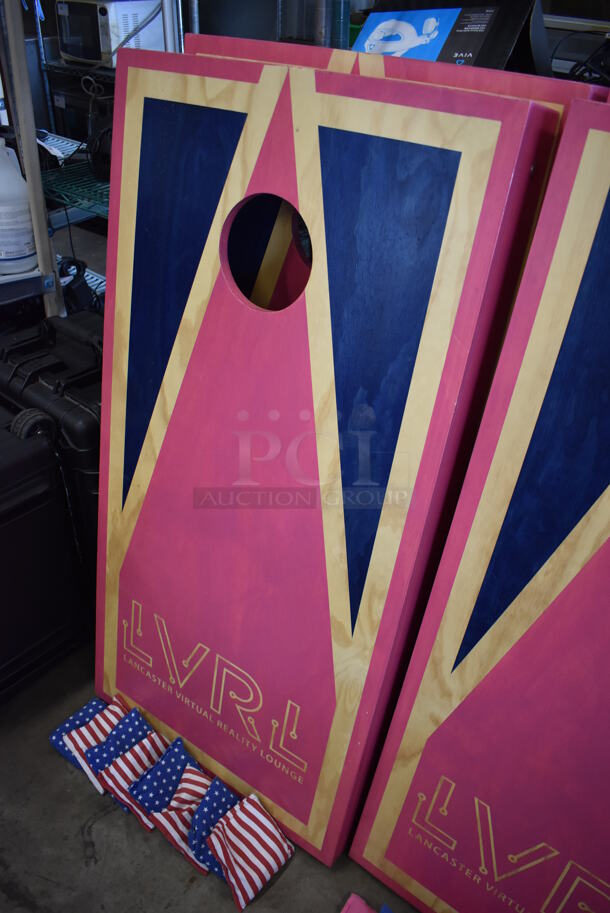 2 Wooden Pink and Blue LVRL Corn Hole Boards w/ 2 Blue Wooden Burky Boards, 4 Blue Starred Bean Bags and 4 Red and White Striped Bean Bags. 24x48x4, 23x23x39, 23x23x63. 2 Times Your Bid! - Image 2 of 6