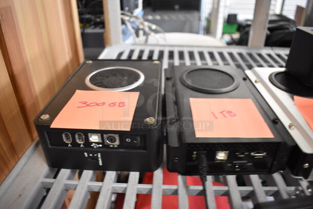 5 Various Electronic Units IncludingI Dsonix iDD-U3102 Super Speed USB, 300 GB Enclosed Hard Drive, 1 TB Enclosed Hard Drive, 1 TB Enclosed Hard Drive and 750 GB Enclosed Hard Drive. 5 Times Your Bid! - Image 3 of 11