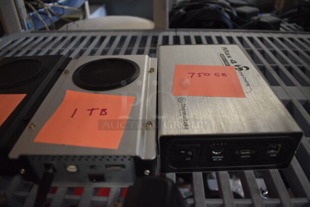 5 Various Electronic Units IncludingI Dsonix iDD-U3102 Super Speed USB, 300 GB Enclosed Hard Drive, 1 TB Enclosed Hard Drive, 1 TB Enclosed Hard Drive and 750 GB Enclosed Hard Drive. 5 Times Your Bid! - Image 4 of 11