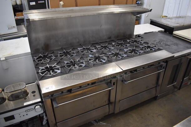 Stainless Steel Commercial Natural Gas Powered 12 Burner Range w/ 2 Convection Ovens, Over Shelf and Back Splash on Commercial Casters. 68x38x57