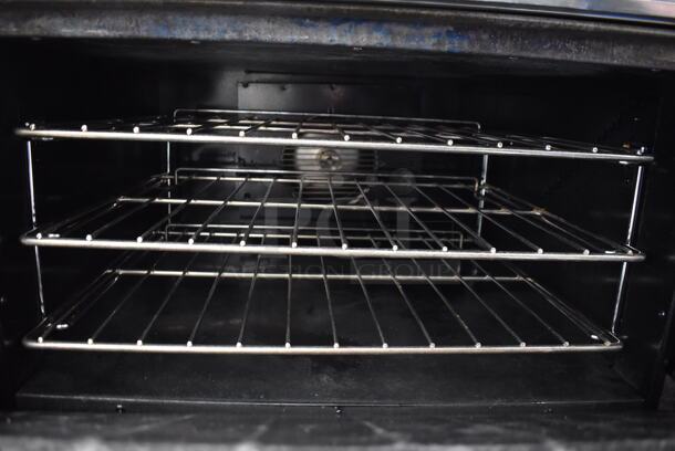 Stainless Steel Commercial Natural Gas Powered 12 Burner Range w/ 2 Convection Ovens, Over Shelf and Back Splash on Commercial Casters. 68x38x57 - Image 6 of 7