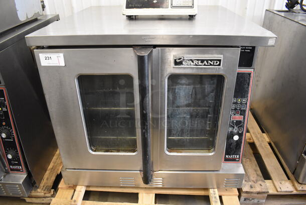 Garland Master 450 Stainless Steel Commercial Natural Gas Powered Full Size Convection Oven w/ View Through Doors and Thermostatic Controls. 38x38x34