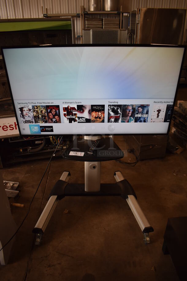 Samsung 50" 4K Smart LED Television on Cart. 120 Volts, 1 Phase. 44x32x55. Buyer Must Pick Up - We Will Not Ship This Item. Tested and Working! - Image 1 of 9