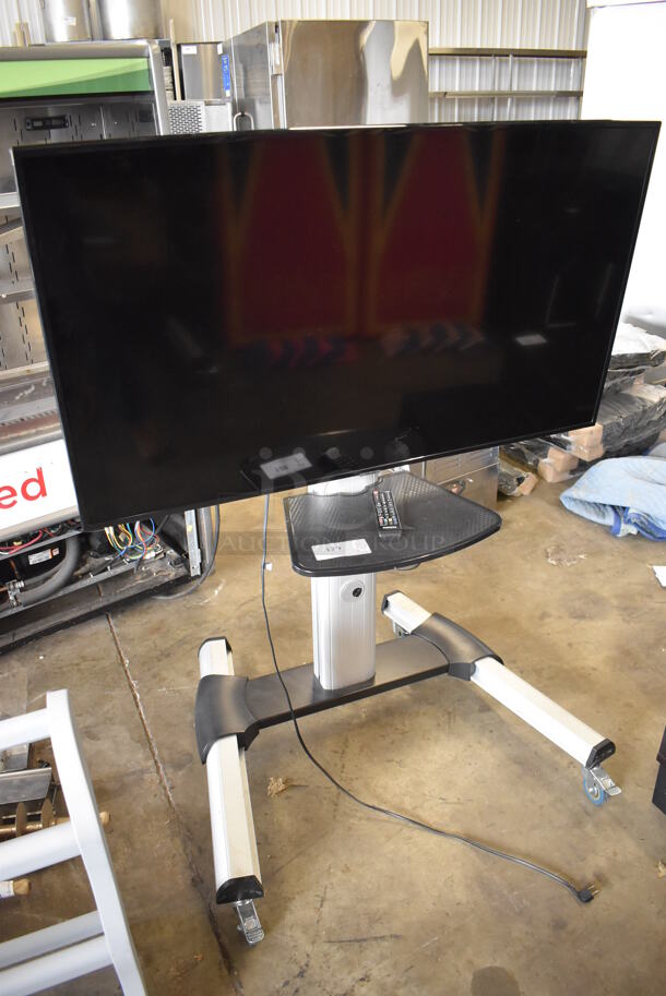 Samsung 50" 4K Smart LED Television on Cart. 120 Volts, 1 Phase. 44x32x55. Buyer Must Pick Up - We Will Not Ship This Item. Tested and Working! - Image 9 of 9