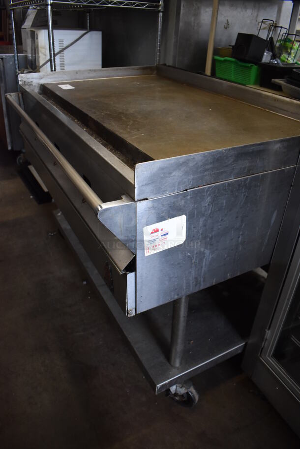 Wolf Stainless Steel Commercial Natural Gas Powered Flat Top Griddle w/ Under Shelf on Commercial Casters. 48x34x38 - Image 3 of 6