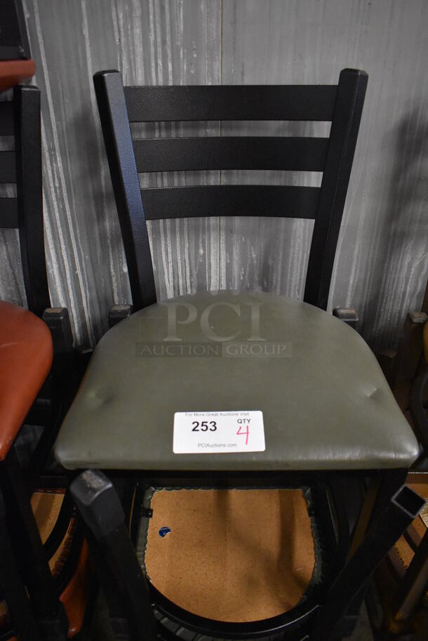 4 Black Metal Dining Chairs w/ Green Seat Cushion. 17x17x32. 4 Times Your Bid!
