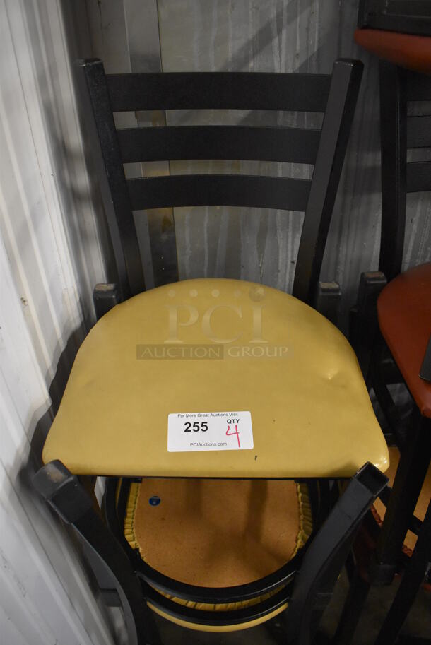 4 Black Metal Dining Chairs w/ Yellow Seat Cushion. 17x17x32. 4 Times Your Bid!