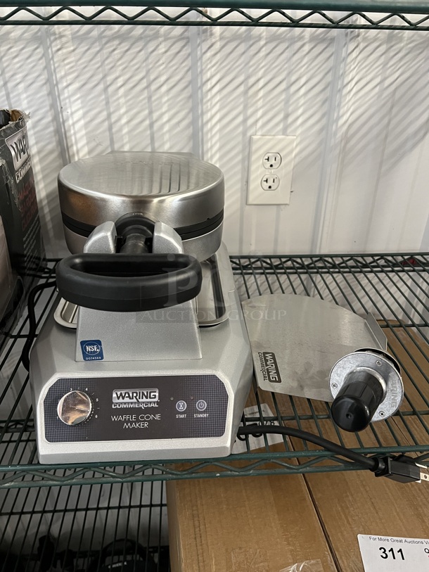 BRAND NEW! Waring WWCM180 Stainless Steel Commercial Countertop Waffle Cone Press w/ Waffle Cone Former. 120 Volts, 1 Phase. 9x17x10. Tested and Working!