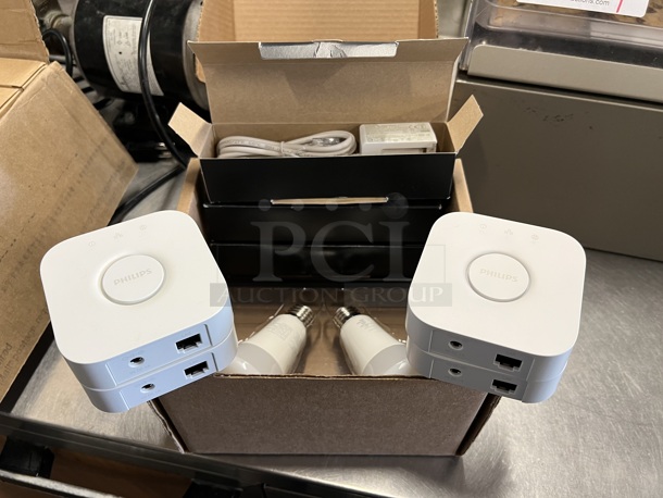 24 Phillips Hue White and Color Light Bulbs w/ 5 Philips Hue Controller. 24 Times Your Bid! - Image 7 of 8