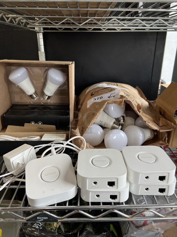 24 Phillips Hue White and Color Light Bulbs w/ 5 Philips Hue Controller. 24 Times Your Bid! - Image 8 of 8