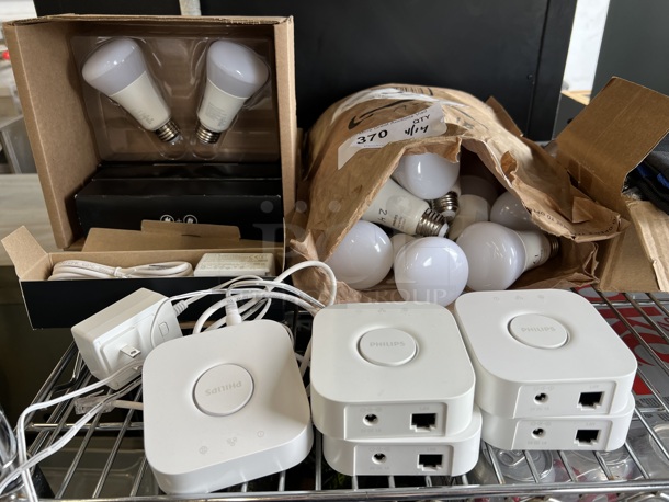 24 Phillips Hue White and Color Light Bulbs w/ 5 Philips Hue Controller. 24 Times Your Bid!