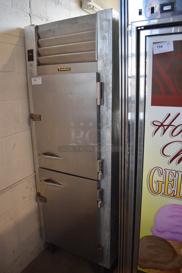 Traulsen G12000 Stainless Steel Commercial 2 Half Size Door Reach In Freezer w/ Poly Coated Racks on Commercial Casters. 115 Volts, 1 Phase. 30x34x83. Tested and Working! - Image 2 of 8