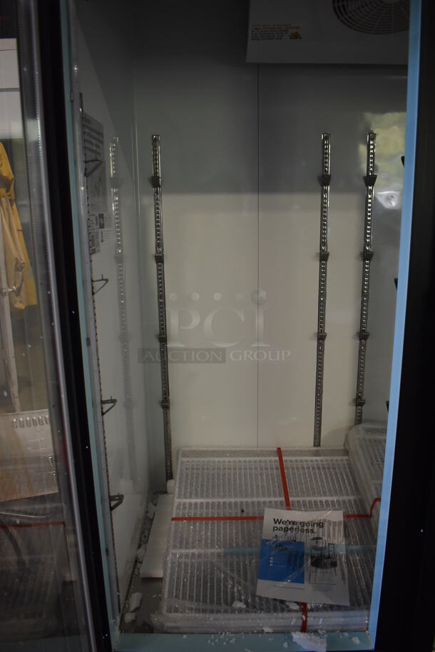 BRAND NEW SCRATCH AND DENT! Avantco 178GDC69HCB Metal Commercial 3 Door Reach In Cooler Merchandiser w/ Poly Coated Racks and LED Lighting. Bottom of Frame is Bent. 115 Volts, 1 Phase. 78x30x79. Tested and Working! - Image 5 of 9