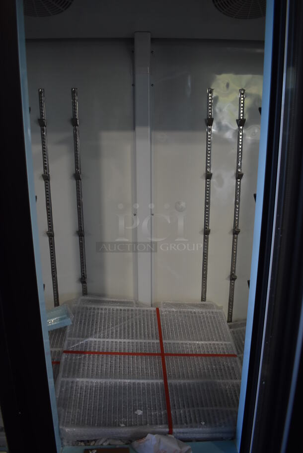 BRAND NEW SCRATCH AND DENT! Avantco 178GDC69HCB Metal Commercial 3 Door Reach In Cooler Merchandiser w/ Poly Coated Racks and LED Lighting. Bottom of Frame is Bent. 115 Volts, 1 Phase. 78x30x79. Tested and Working! - Image 7 of 9