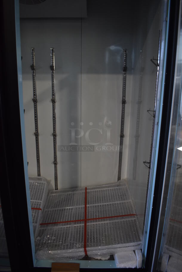 BRAND NEW SCRATCH AND DENT! Avantco 178GDC69HCB Metal Commercial 3 Door Reach In Cooler Merchandiser w/ Poly Coated Racks and LED Lighting. Bottom of Frame is Bent. 115 Volts, 1 Phase. 78x30x79. Tested and Working! - Image 8 of 9