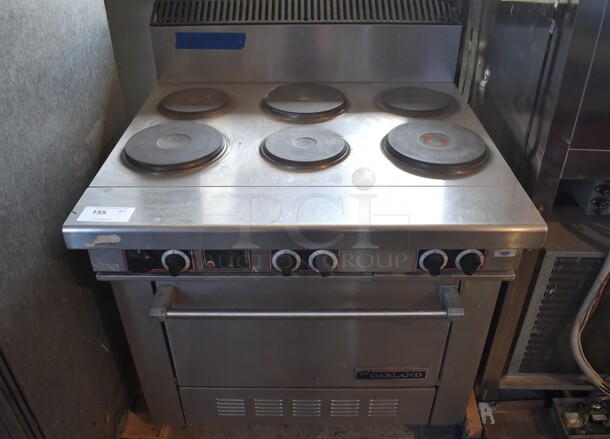 Garland Stainless Steel Commercial Electric Powered 6 Burner Hot Plate Range w/ Oven and Back Splash. 208-250 Volts, 1 or 3 Phase. 36x36x48 - Image 1 of 7