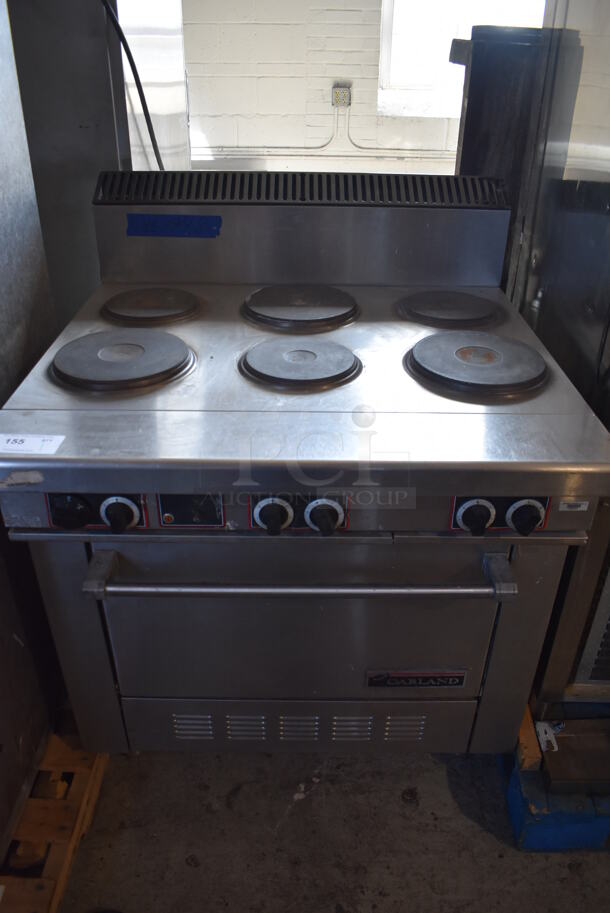 Garland Stainless Steel Commercial Electric Powered 6 Burner Hot Plate Range w/ Oven and Back Splash. 208-250 Volts, 1 or 3 Phase. 36x36x48 - Image 2 of 7