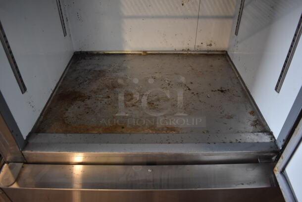 Avantco 178A19FHC Stainless Steel Commercial Single Door Reach In Freezer w/ Poly Coated Racks on Commercial Casters. 115 Volts, 1 Phase. 28x26x83. Tested and Working! - Image 5 of 8