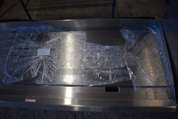 BRAND NEW SCRATCH AND DENT! 2022 Cooking Performance Group 351GTCPG72NL Stainless Steel Commercial Countertop 72" Natural Gas Powered Flat Top Griddle w/ Thermostatic Controls. Missing Knobs. 180,000 BTU. 72x30x13 - Image 5 of 9