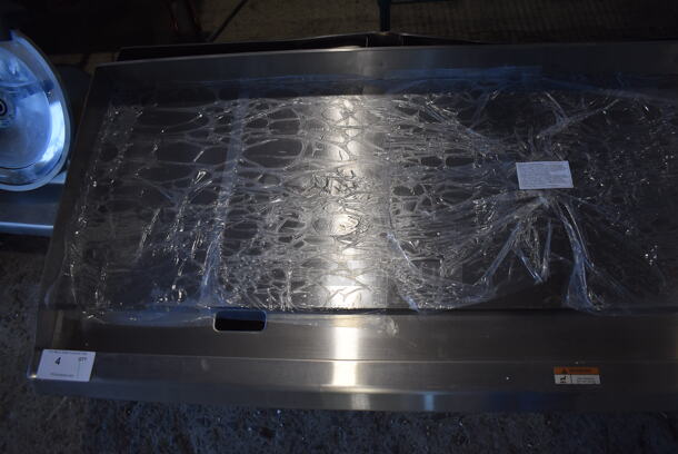 BRAND NEW SCRATCH AND DENT! 2022 Cooking Performance Group 351GTCPG72NL Stainless Steel Commercial Countertop 72" Natural Gas Powered Flat Top Griddle w/ Thermostatic Controls. Missing Knobs. 180,000 BTU. 72x30x13 - Image 6 of 9
