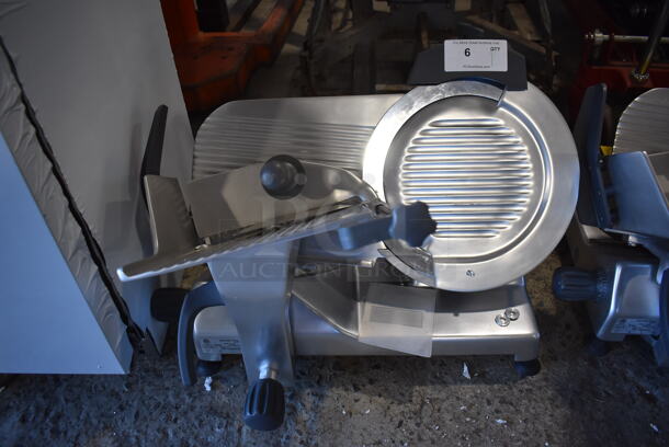 BRAND NEW SCRATCH AND DENT! Hobart Centerline EDGE14-11 Stainless Steel Commercial Countertop Meat Slicer w/ Blade Sharpener.  Backside Knob is Broken. 115 Volts, 1 Phase. 30x24x22. Tested and Powers On But Blade Does Not Move - Image 1 of 8