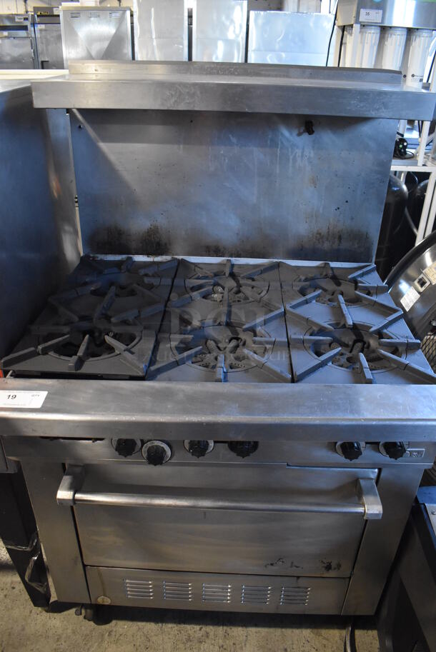 Stainless Steel Commercial Natural Gas Powered 6 Burner Range w/ Oven, Over Shelf and Back Splash on Commercial Casters. 36x34x61