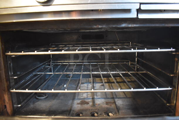 Stainless Steel Commercial Natural Gas Powered 6 Burner Range w/ Oven, Over Shelf and Back Splash on Commercial Casters. 36x34x61 - Image 7 of 7