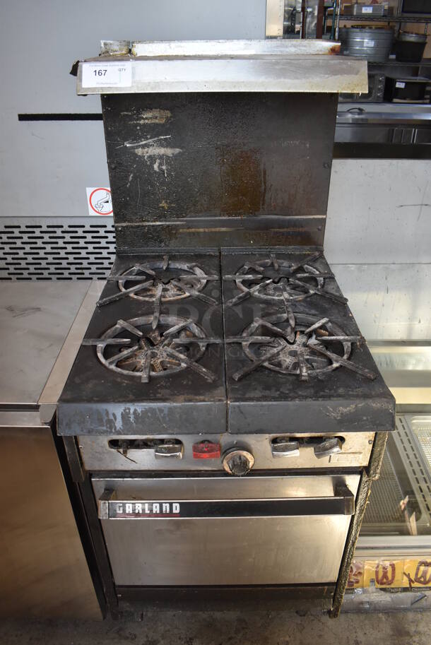 Garland Metal Commercial Natural Gas Powered 4 Burner Range w/ Oven, Over Shelf and Back Splash. 24x32x59.5