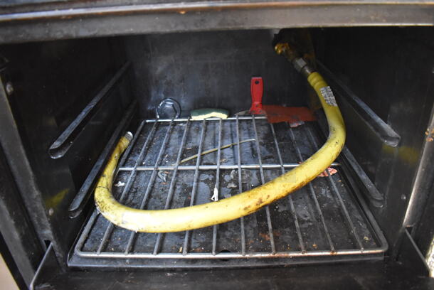 Garland Metal Commercial Natural Gas Powered 4 Burner Range w/ Oven, Over Shelf and Back Splash. 24x32x59.5 - Image 4 of 6