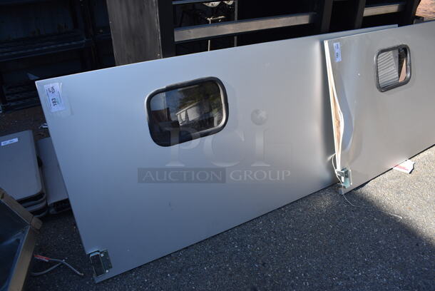 BRAND NEW SCRATCH AND DENT! Curtron Service-Pro Series 30 Double Aluminum Swinging Traffic Door. Goes GREAT w/ Lot 182! 35x2.5x82