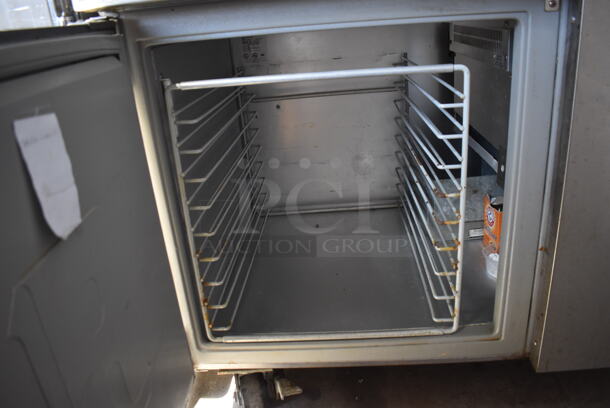 Randell 8148NM Stainless Steel Commercial Pizza Prep Table w/ 2 Over Shelves on Commercial Casters. 115 Volts, 1 Phase. 48x34x72. Tested and Powers On But Does Not Get Cold - Image 5 of 6