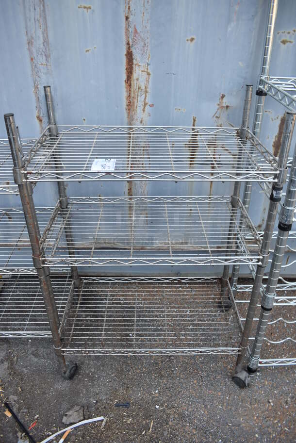 Chrome Finish 3 Tier Wire Shelving Unit. BUYER MUST DISMANTLE. PCI CANNOT DISMANTLE FOR SHIPPING. PLEASE CONSIDER FREIGHT CHARGES. 23x13x33.5 - Image 1 of 3