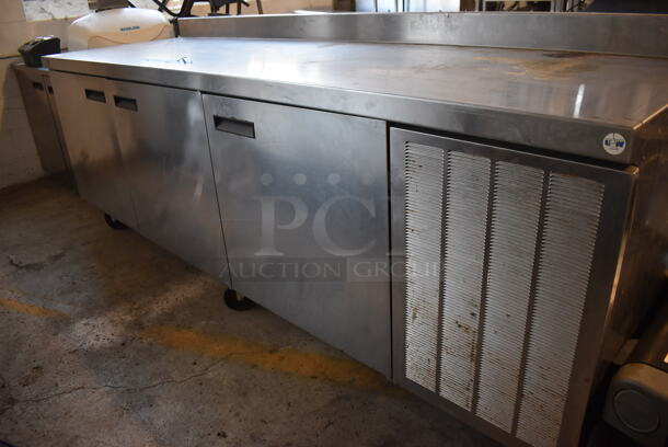 Delfield Stainless Steel Commercial 3 Door Work Top Cooler w/ Back Splash on Commercial Casters. 115 Volts, 1 Phase. 99x32x39. Tested and Powers On But Does Not Get Cold - Image 3 of 7