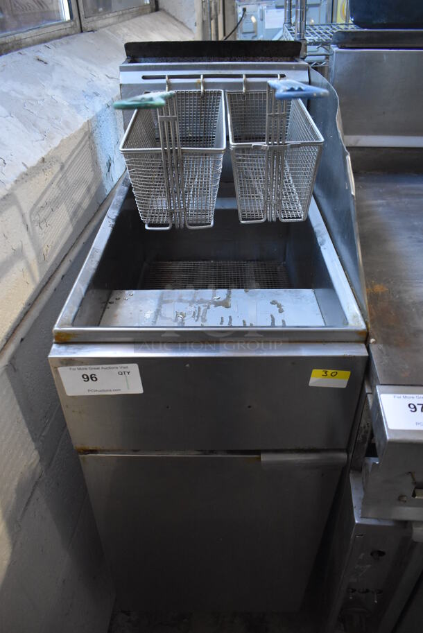 Stainless Steel Commercial Natural Gas Powered Floor Style Deep Fat Fryer w/ 2 Metal Fry Baskets and Right Side Splash Guard on Commercial Casters. 15.5x30x48