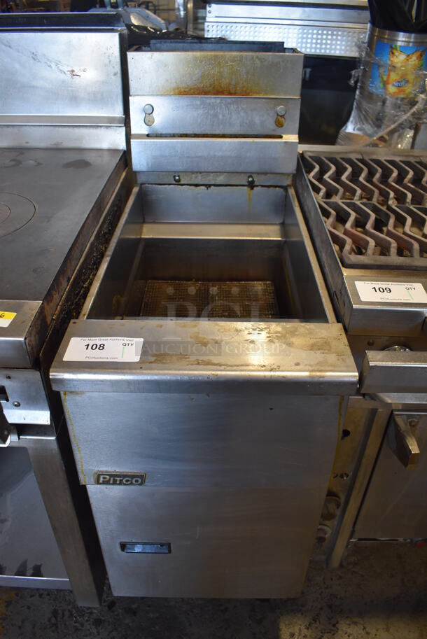 Pitco Frialator SG14 Stainless Steel Commercial Floor Style Natural Gas Powered Deep Fat Fryer on Commercial Casters. 110,000 BTU. 15.5x34x48