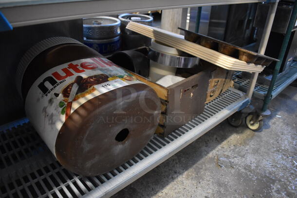 ALL ONE MONEY! Tier Lot of Various Items Including Metal Muffin Baking Pan, Poly Lid and Nutella Display Jar. - Image 5 of 5