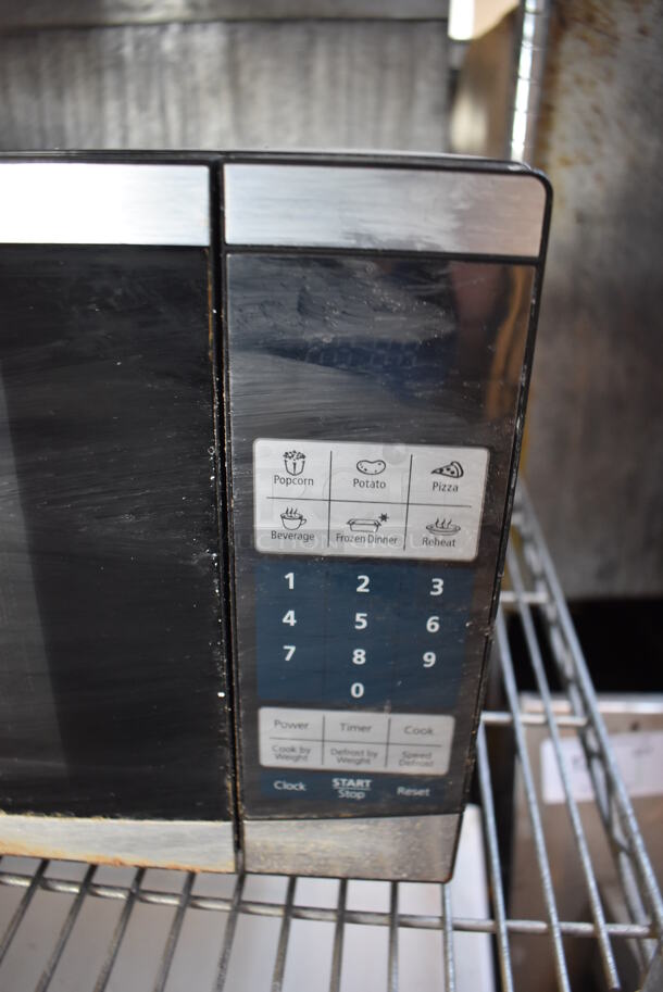 Oster OGYU701 Metal Countertop Microwave Oven w/ Plate. 115 Volts, 1 Phase. 18x11x11 - Image 2 of 6