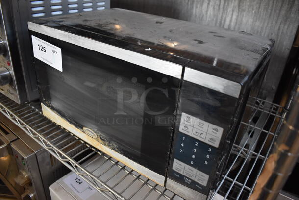 Oster OGYU701 Metal Countertop Microwave Oven w/ Plate. 115 Volts, 1 Phase. 18x11x11 - Image 3 of 6